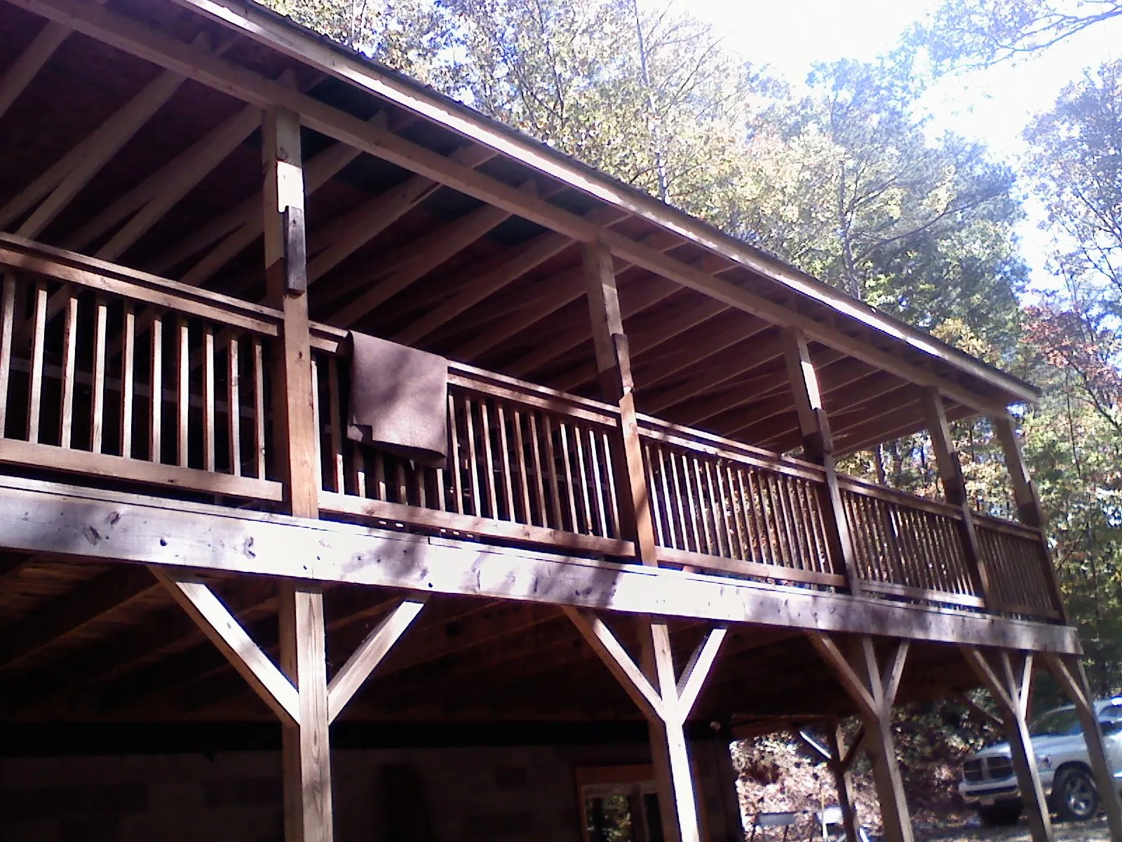 Timber framing under a new elevated porch and deck — Roof Leak Repair in Springville by Roofing Brothers